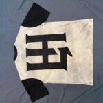 L17 撞色洗水割破烫钻短袖  P65