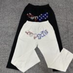 7799#《图案全钻》黑色 白色毛圈面料s~xl上衣p95.2699#黑色裤子p100